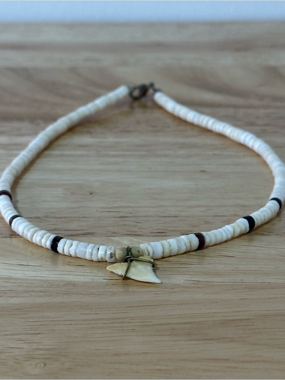 Handcrafted White Bead Necklace with Shark Tooth Pendant